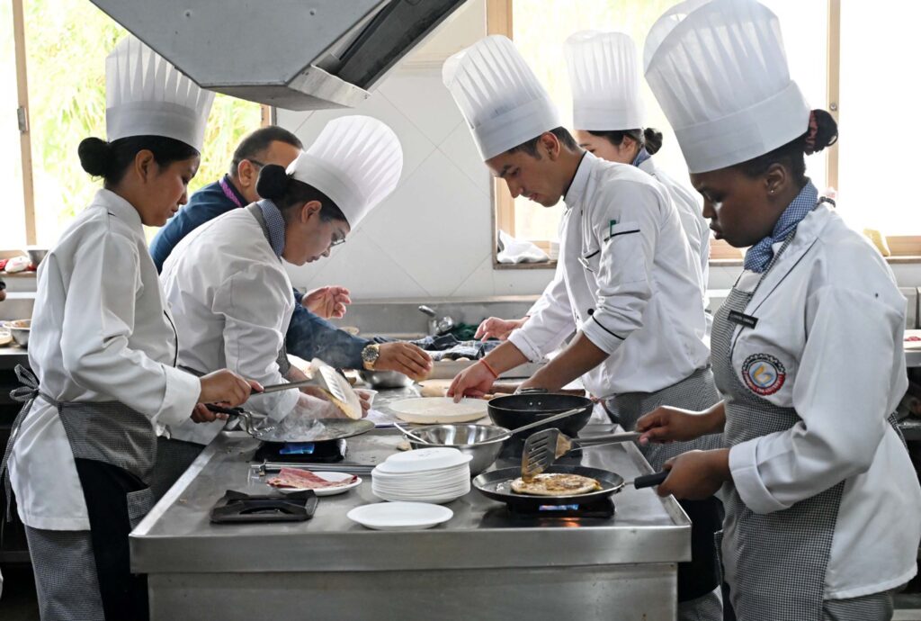 GraphicEra, AsiaBookOfRecords, DehradunNews, HospitalityManagement, WorldRecord, IndianCuisine, ParathaFestival, GraphicEraUniversity, CulinaryRecord, UttarakhandPride